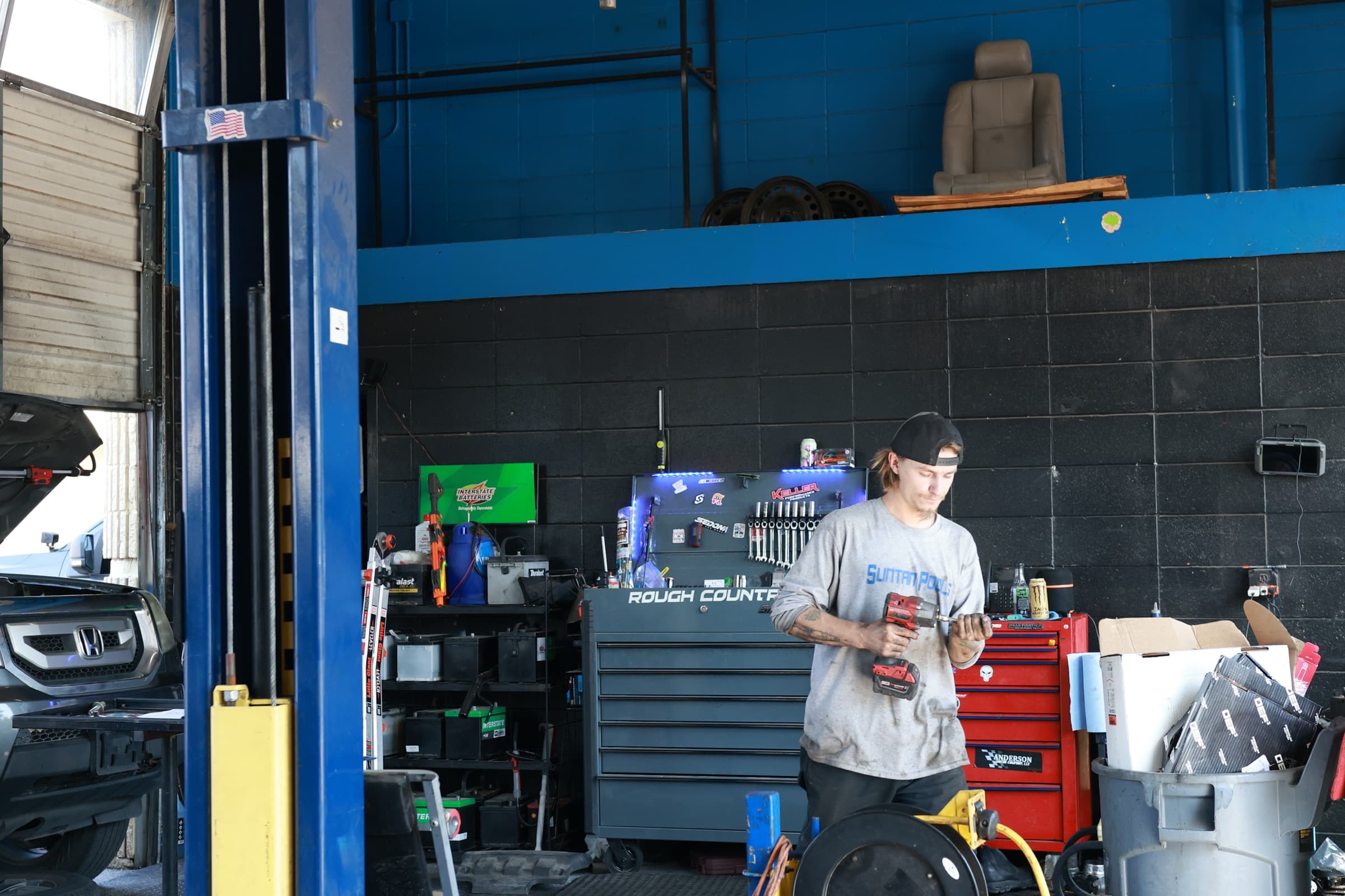 Patriot Auto Repair technician working in the shop with professional tools